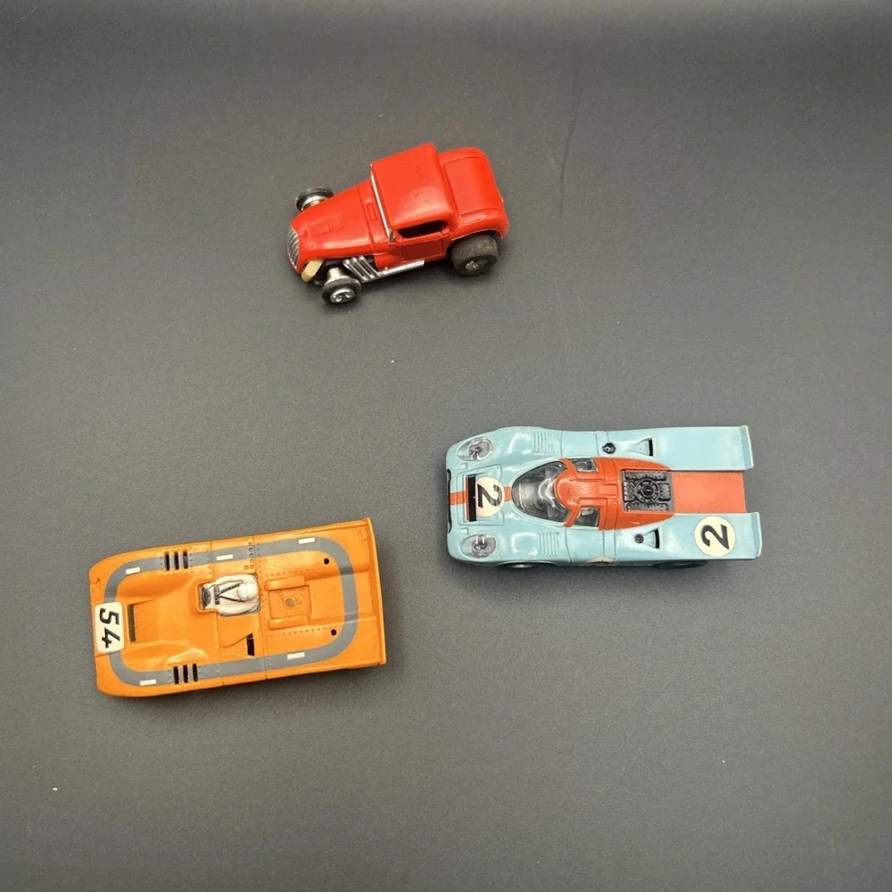 AURORA MCLAREN  AFX RARE TEAL BLUE #54  & YELLOW FERRARI CAN AM HO SLOT CAR #15